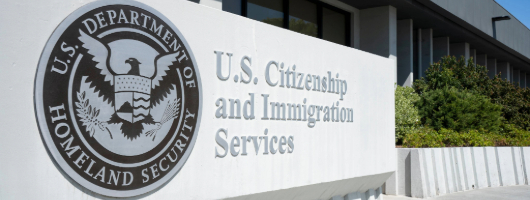 Image of a USCIS Federal Agency sign.