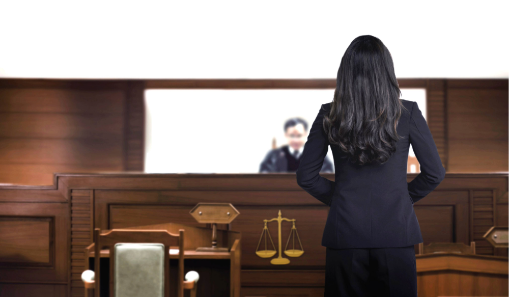 Image of an attorney at a trial.